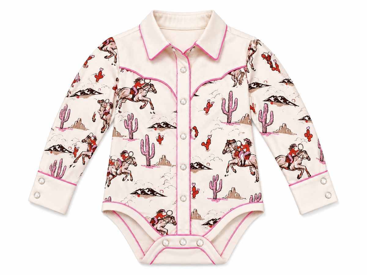 Cowgirl desert and pink cactus long sleeve infant pearl snap onesie with pink piping detail